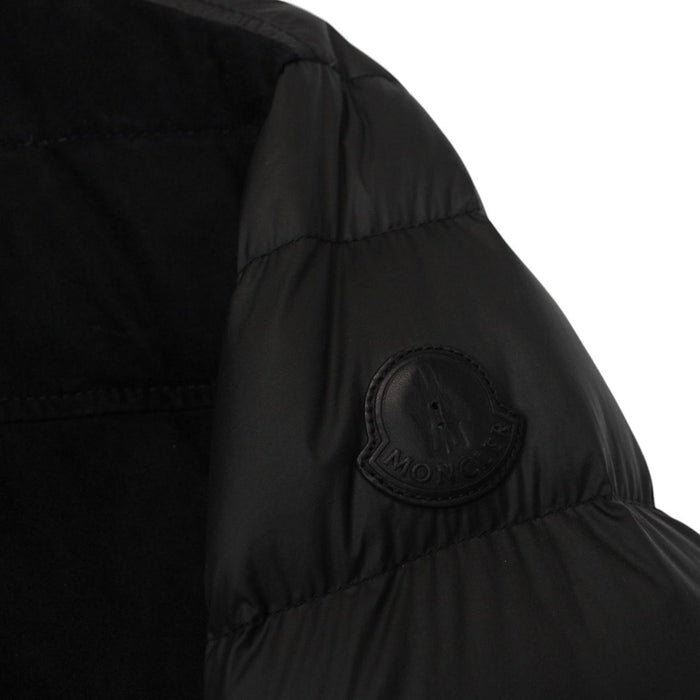 Moncler black suede leather down jacket with full zip and missing badge detail.