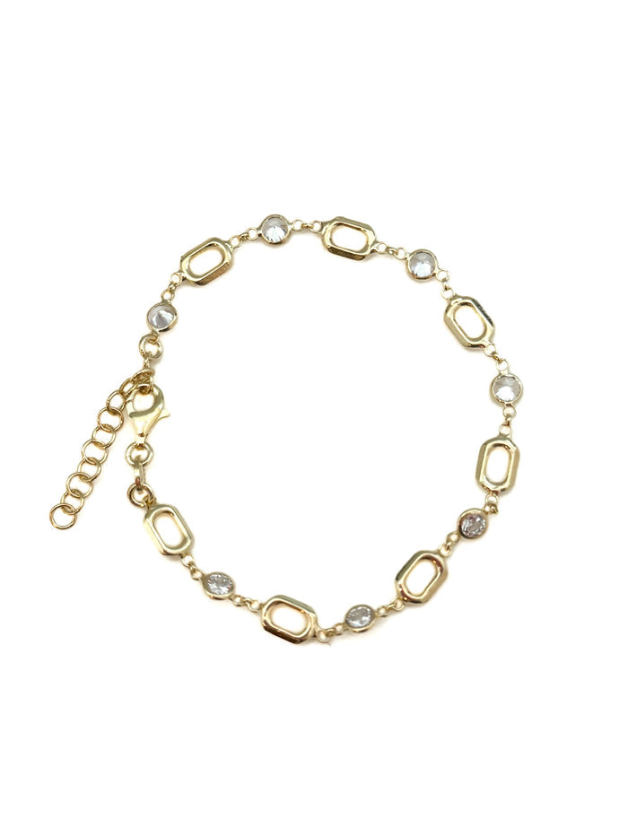 Gold chain bracelet with interlocking links on a white background