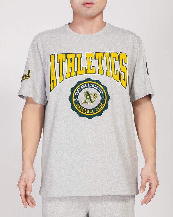 Pro Standard Oakland Athletics Crest Emblem SJ Tee featuring team logo and crest on a casual baseball-style t-shirt.