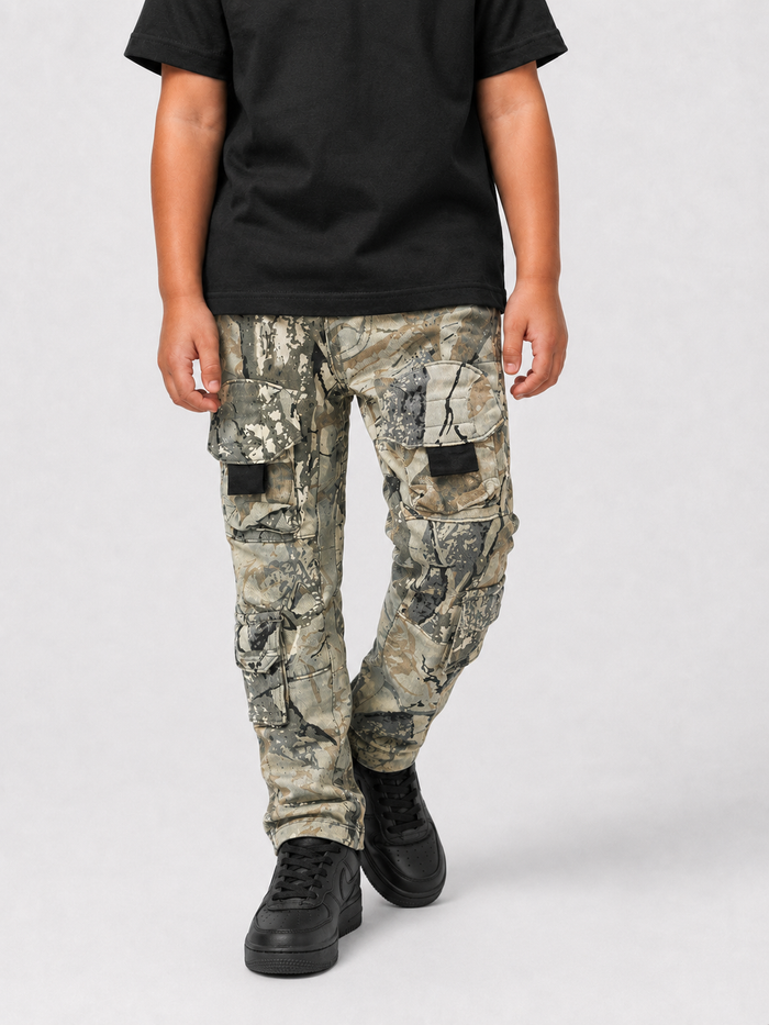 Kids denim cargo utility pants by OPS Kids in sand camo, featuring durable fabric and multiple pockets for active wear.