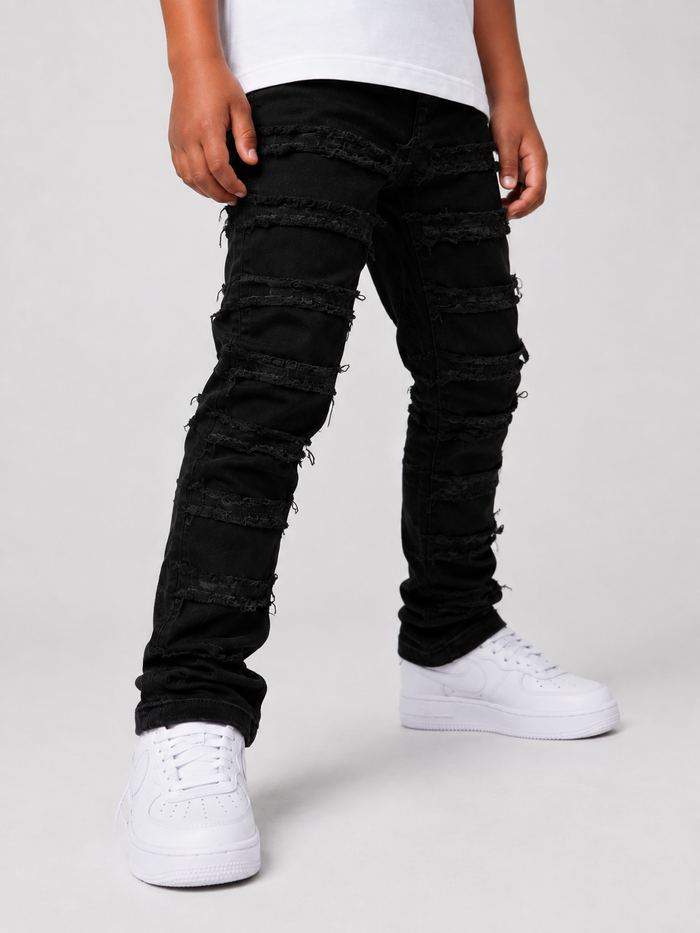 Kids denim jeans by OPS Kids with frayed edges and taped trim in jet black, featuring a stylish and durable design.