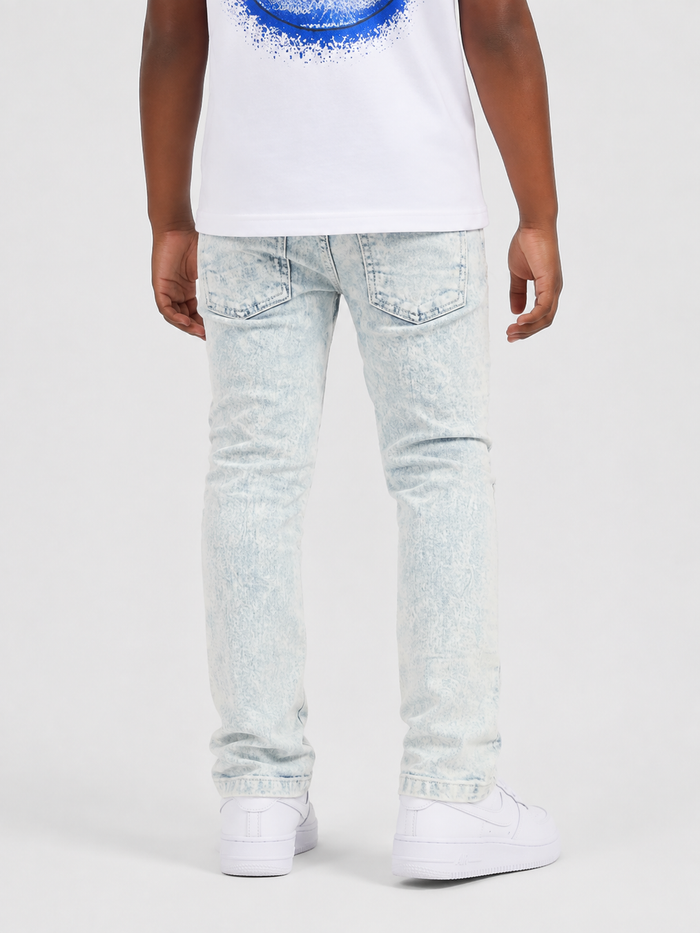 Kids denim jeans by OPS Kids with frayed hem and taped trim in bleach wash, casual and stylish for children.