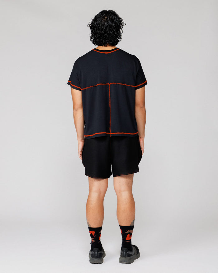Outnback Running Short in black, back view on model
