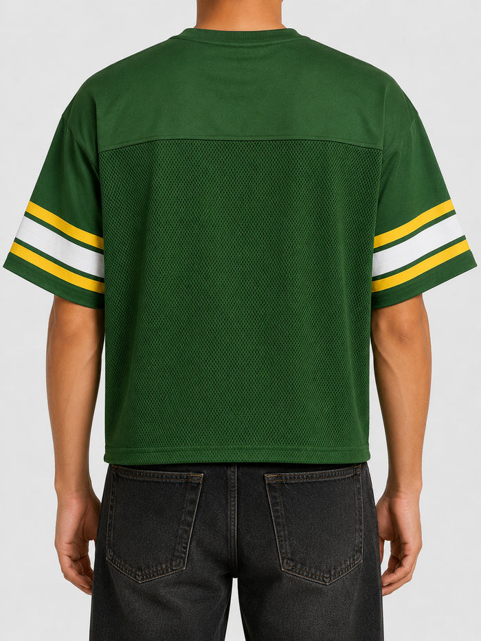Green Papercut Child Of God cropped jersey T-shirt with graphic design, casual fit, and short sleeves.