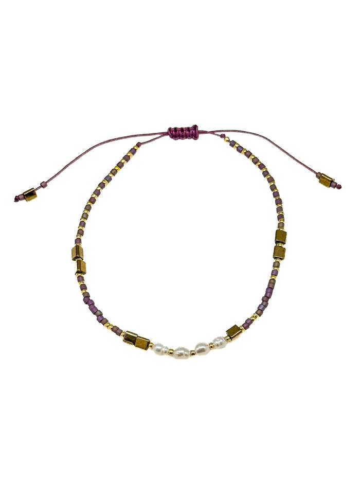 Bracelet with multicolored beads on a white background