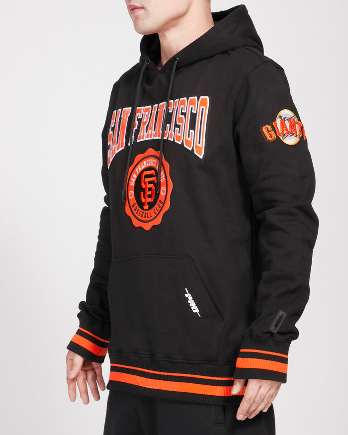 Pro Standard hoodie with San Francisco Giants crest emblem, featuring ribbed fabric and front pouch pocket.
