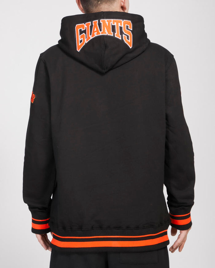 Pro Standard San Francisco Giants Crest Emblem hoodie featuring team logo and ribbed fabric detail, casual sportswear for fans.
