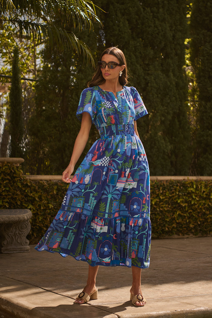Punta Alta Ordy Smocked Midi Dress