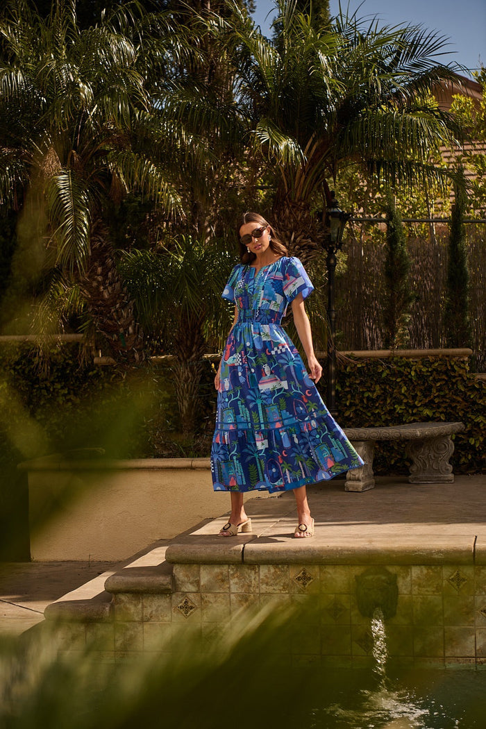 Punta Alta Ordy Smocked Midi Dress
