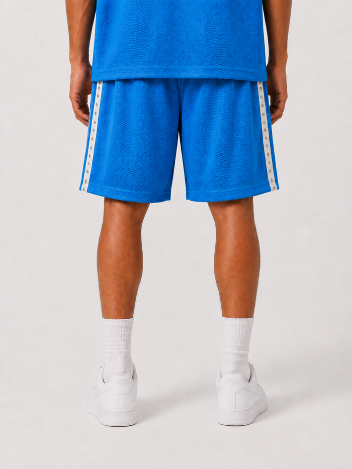 Rare Peace 'BIG EYE' rhinestone mesh shorts in cobalt blue, featuring eye-catching design and sparkling details.