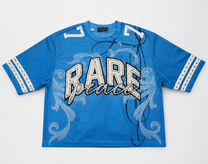 Rare Peace 'BIG EYE' rhinestone oversized mesh jersey top in cobalt blue, featuring bold eye design and boxy fit.