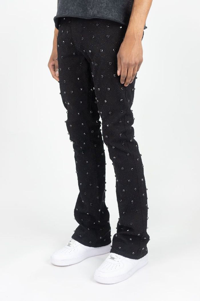 Black Rebel Denim Diamond Stacked Flare Denim jeans with layered, flared style and detailed stitching visible in the image.