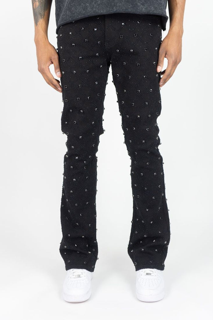 Black Rebel Denim Diamond Stacked Flare Denim jeans with layered stacked design and flare cut, displayed on a white background.