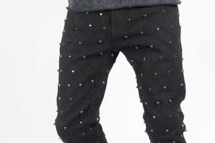 Black Rebel Denim Diamond Stacked Flare Jeans showing the fitted waist and flared leg style.