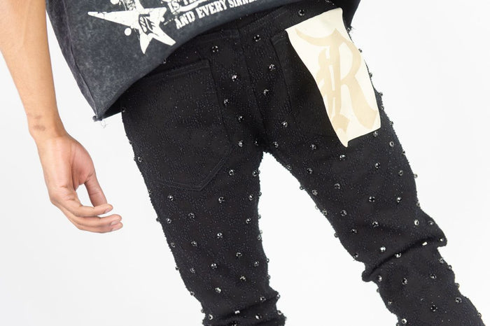 Rebel Denim Diamond Stacked Flare Denim in black, showcasing the stylish stacked flare design and classic denim texture.