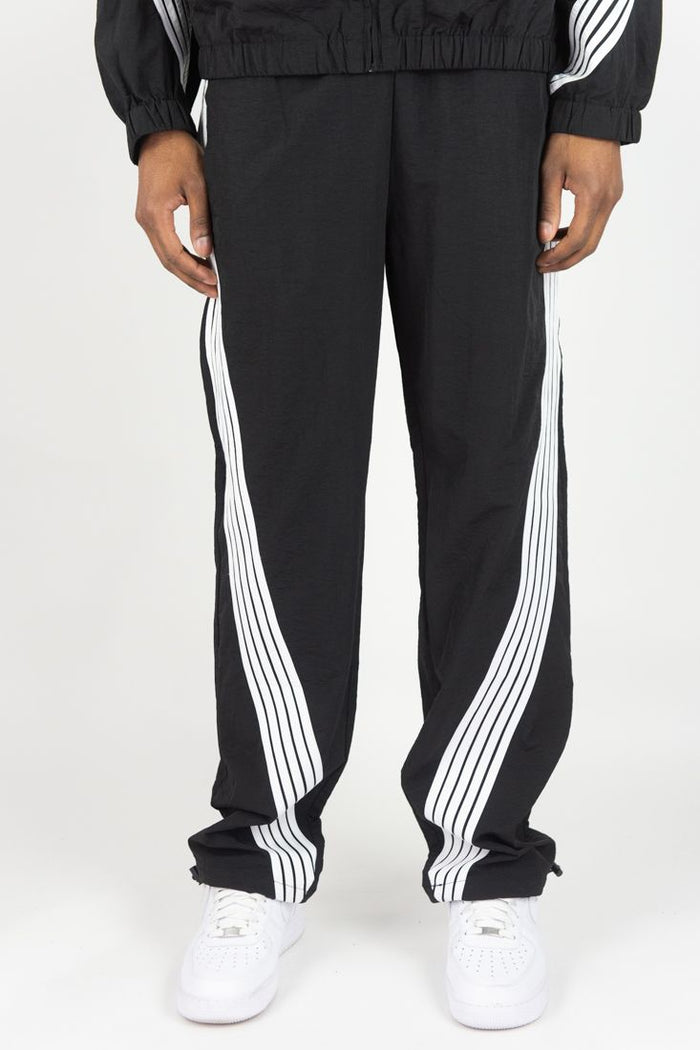 Rebel Minds Black Bent Stripes Nylon Sweatpants with elastic waistband and tapered fit, casual athletic style.