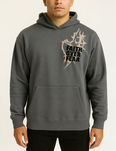 Rebel Minds Faith Over Fear hoodie in charcoal, featuring bold print and comfortable fabric, shown on a model.
