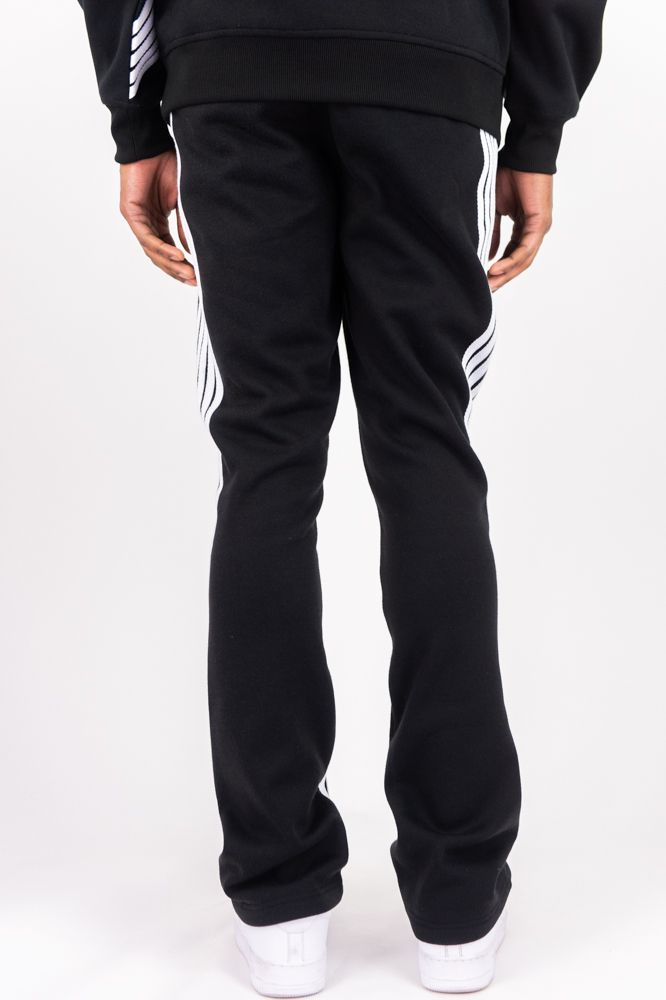 Rebel Minds Five Stripes black and white stacked sweatpants with logo detail, comfortable casual athletic wear.