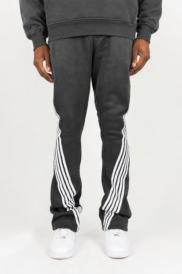 Rebel Minds Five Stripes stacked grey and white sweatpants with a relaxed fit and elastic waistband.