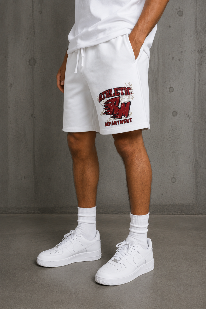 Rebel Minds Flaming RM white interlock shorts with bold flame design and comfortable fit, shown on a model.