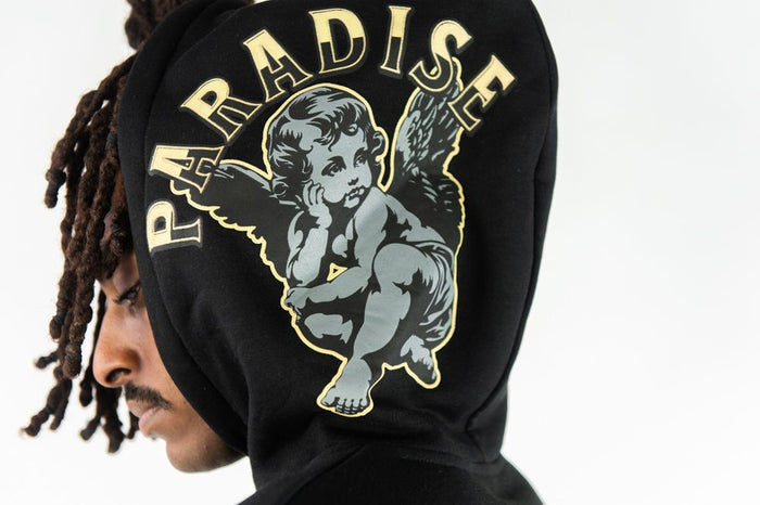 Rebel Minds Paradise hoodie in black, featuring a comfortable fit and stylish design, ideal for casual wear.