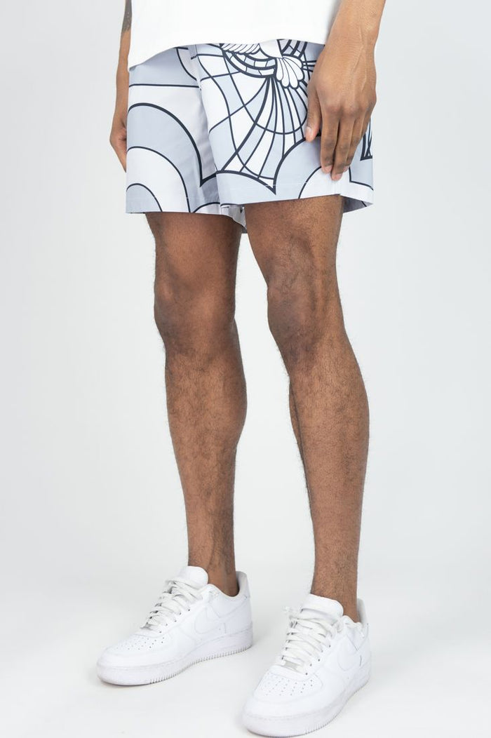 Rebel Minds 'RBL' grey board shorts for men, featuring a relaxed fit and stylish design, shown on a model.