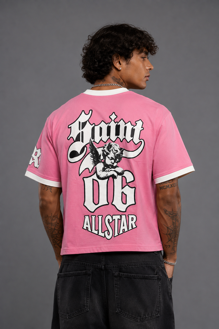 Pink Rebel Minds Saint Chenille Ringer T-Shirt featuring a classic tee design with contrasting collar and sleeve accents.