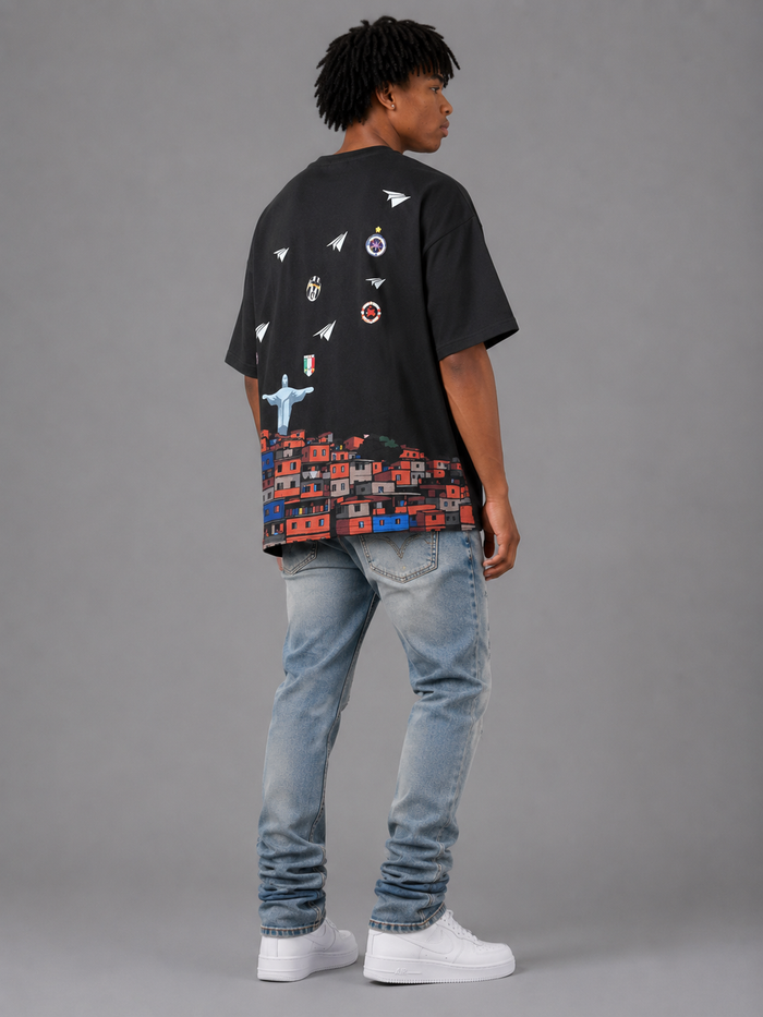 Red Letters brand black oversized T-shirt with "Favelas" in bold red letters, casual streetwear style.