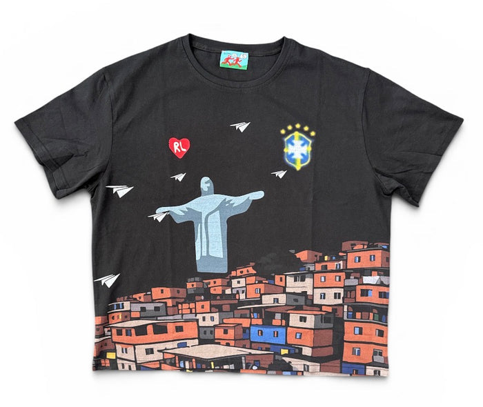 Red Letters "Favelas" oversized black T-shirt with bold white text, casual fit, and soft fabric visible on the front.