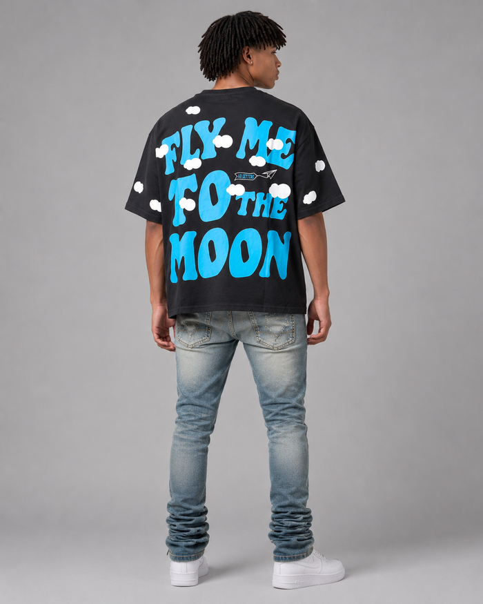 Red Letters "Fly Me To The Moon" oversized black T-shirt with bold white text, casual fit, featuring a stylish graphic design.