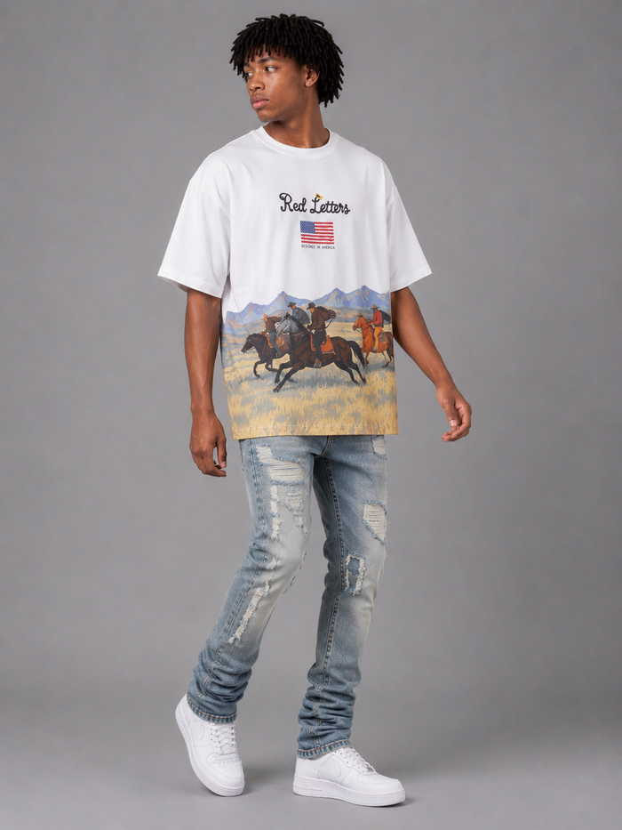 White oversized T-shirt by Red Letters featuring red "The Wild West" text graphic on the front.