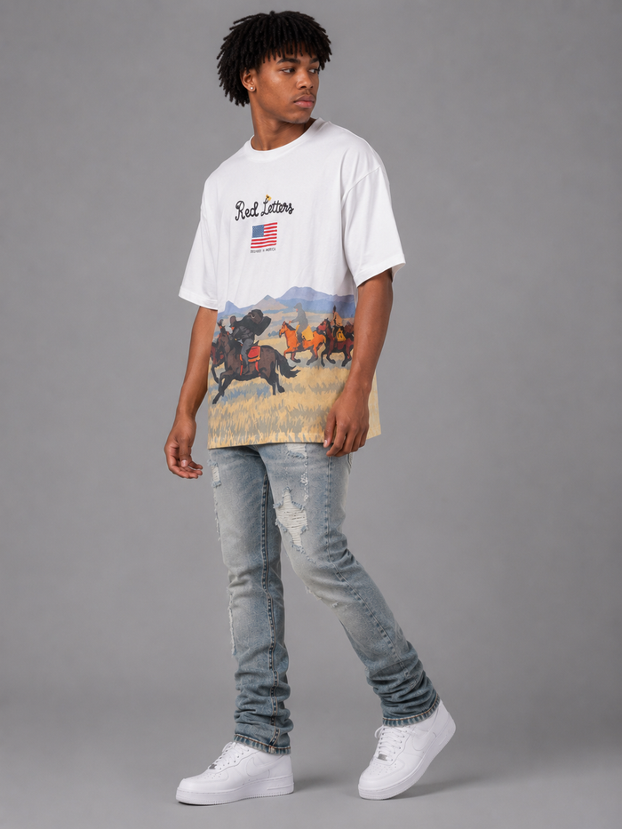 Red Letters "The Wild West" oversized white T-shirt featuring bold red text and relaxed fit.