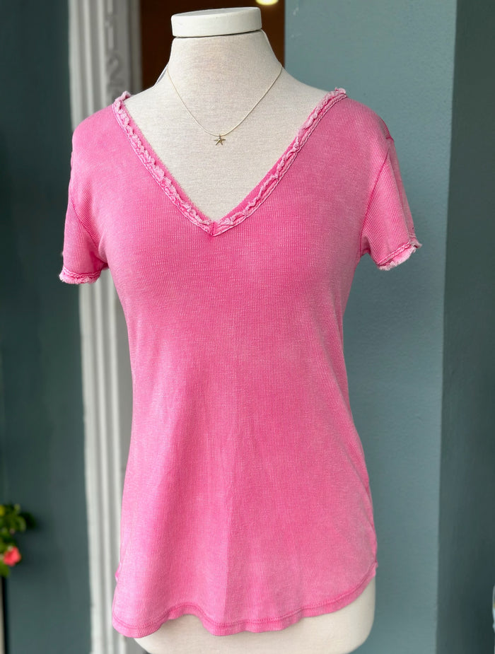 Reece Raw Edge Tee in Hot Pink on mannequin. 100% cotton V neck top made in Italy