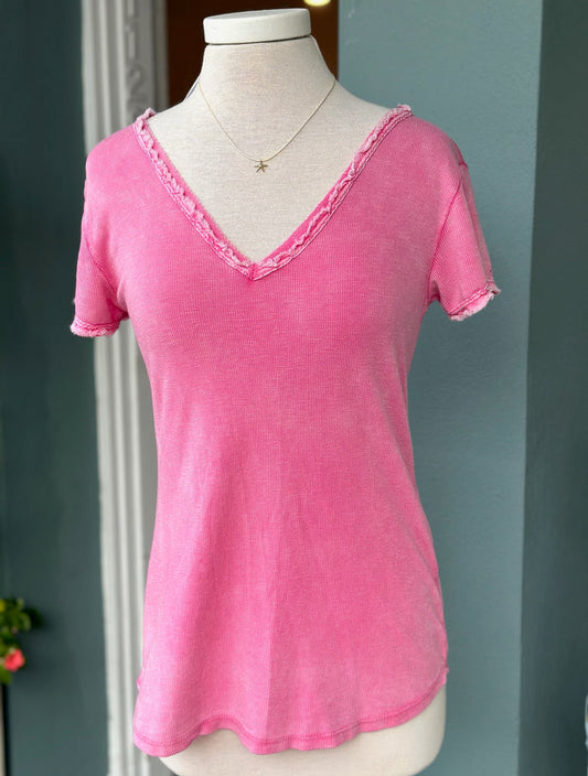 Reece Raw Edge Tee in Hot Pink on mannequin. 100% cotton V neck top made in Italy