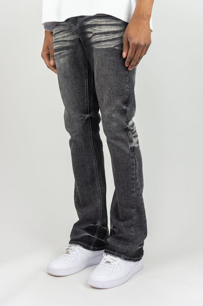 Roar Denim stacked flare jeans in grey sand, showing the fitted waistband and stylish flared leg with stacked detailing.