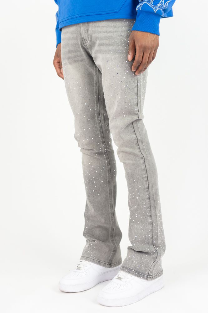 Roar Denim stacked flare denim jeans in grey with rhinestone embellishments, featuring a fashionable flared and stacked design.