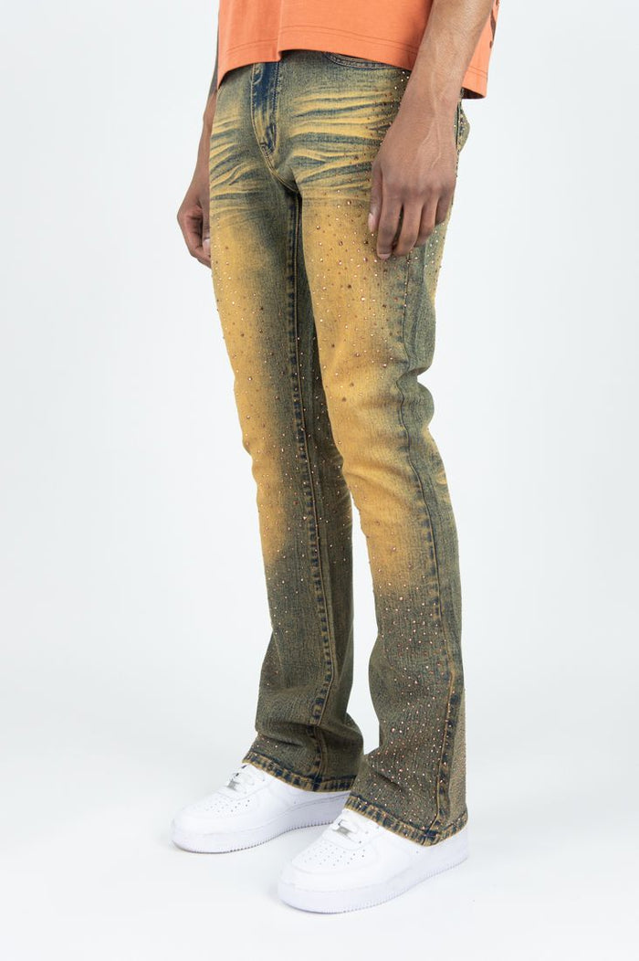 Rust Roar Denim Rhinestone Stacked Flare Denim jeans with rhinestone details and a fitted, flared silhouette.