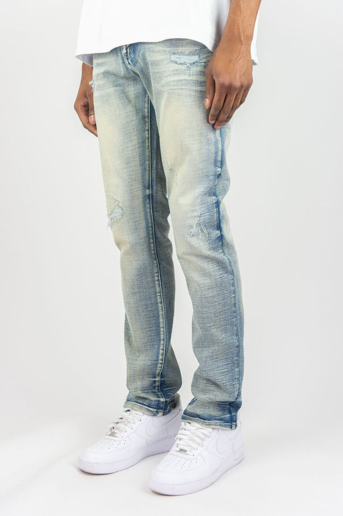 Roar Denim R&R slim straight denim jeans in light sand blue color, showcasing front view with classic five-pocket design.