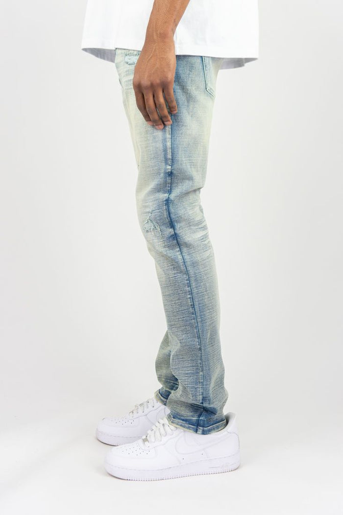 Roar Denim R&R slim straight denim jeans in light sand blue fabric, featuring classic five-pocket design and subtle stitching details.