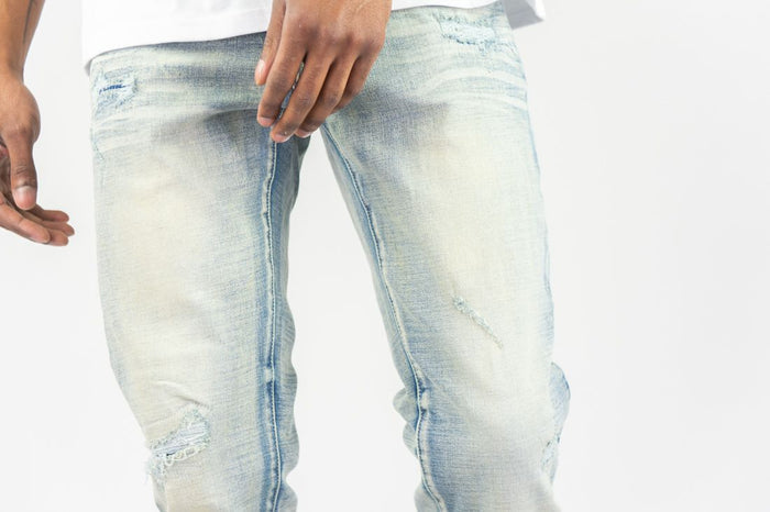 Light sand blue Roar Denim R&R slim straight denim jeans displayed on a white background.