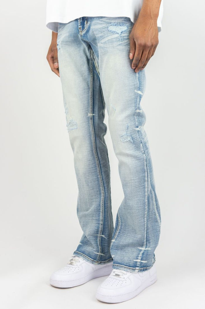 Roar Denim stacked flare jeans in light sand blue denim, featuring a stylish stacked design and classic denim texture.