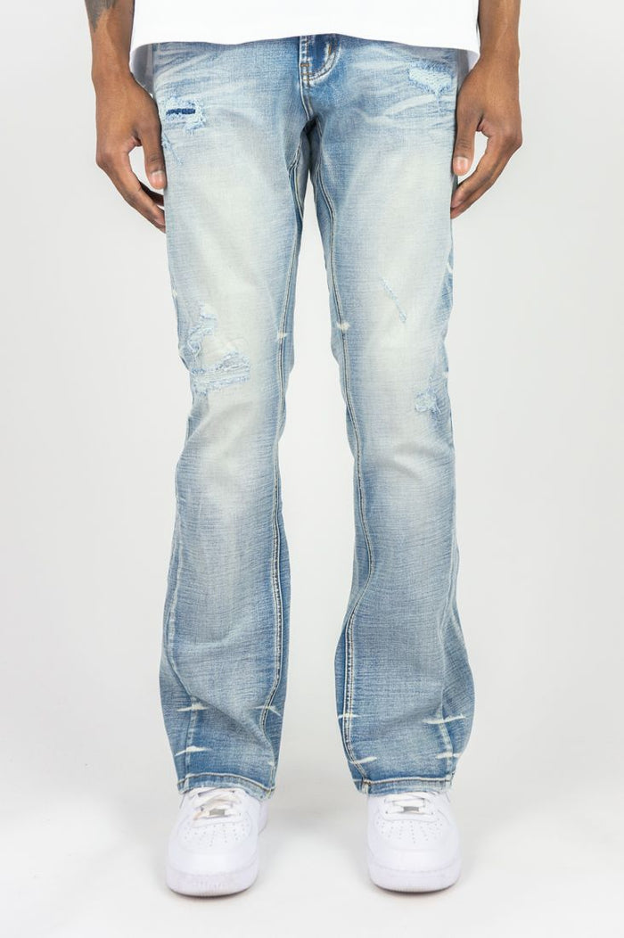 Roar Denim R&R stacked flare denim jeans in light sand blue, showcasing the relaxed fit and stylish stacked design.