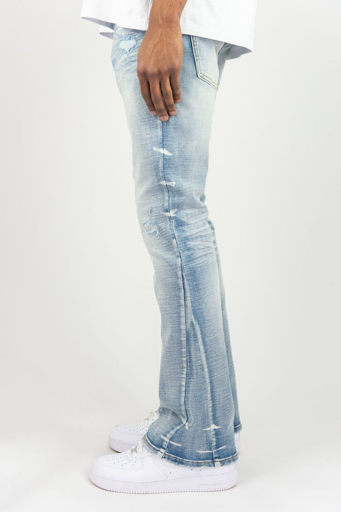 Roar Denim R&R stacked flare denim jeans in light sand blue, showcasing the high-waisted, flared leg design.