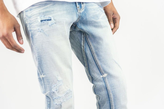 Roar Denim stacked flare jeans in light sand blue denim with a high waist and fitted silhouette, styled with casual clothing.