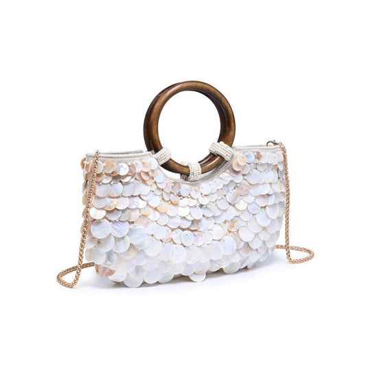 Close-up of the Scarlett Evening Bag displaying shimmering layered shell discs, polished wood ring handles, beaded detailing, and removable chain strap.