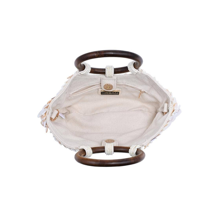 Canvas-lined interior of the Scarlett Evening Bag featuring a zippered pocket, spacious main compartment, magnetic snap closure, and an interior D-ring for keys.