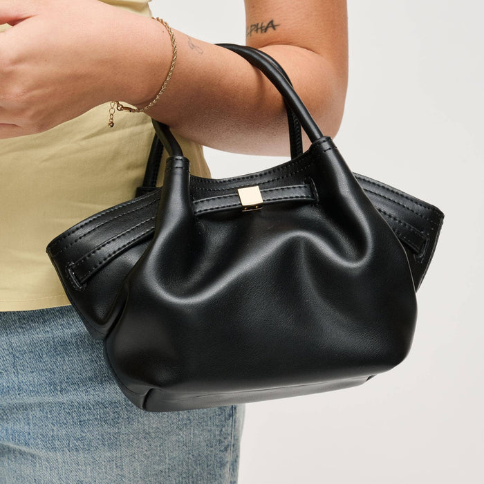Close-up of the Selena Crossbody in black vegan leather featuring a softly gathered silhouette, rolled top handles, and gold-tone hardware.