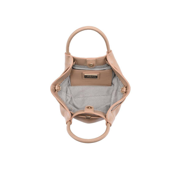 Interior of the Selena Crossbody featuring a herringbone fabric lining, open main compartment, magnetic snap closure, and interior slip pocket.