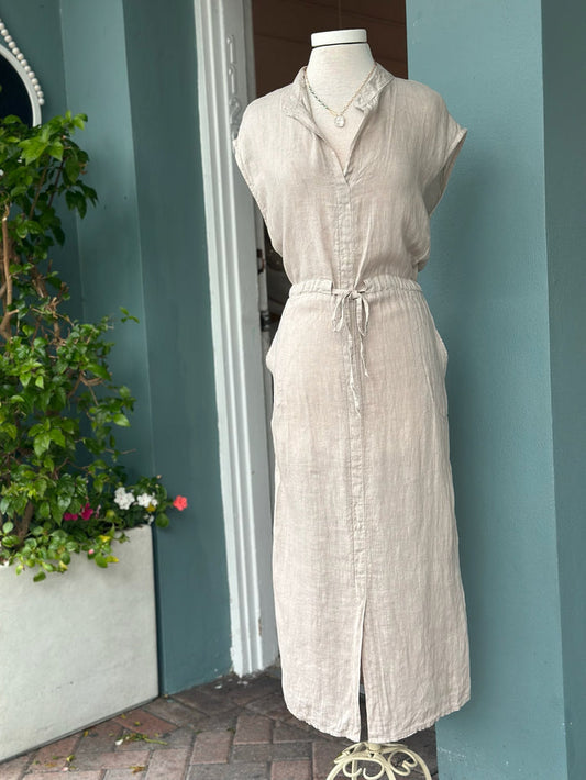 Oatmeal beige linen midi dress made in Italy featuring a split neckline, cap sleeves, adjustable drawstring waist, side pockets, and a relaxed silhouette.