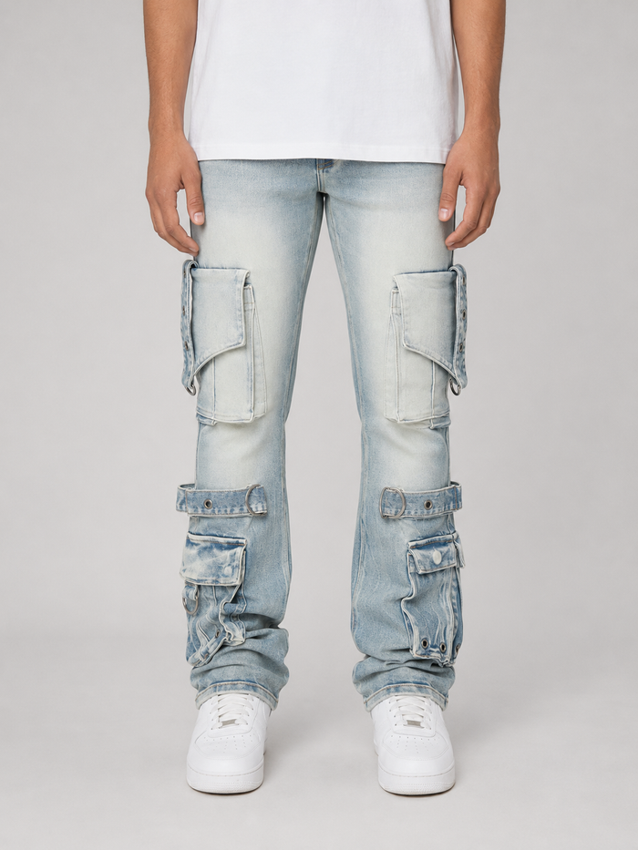 Smoke Rise Eyelet Stacked Flare Cargo jeans in Parsons Blue denim, featuring layered flare design and eyelet details.